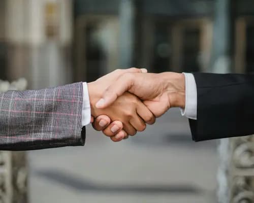 Handshake signifying a mutually satisfactory agreement